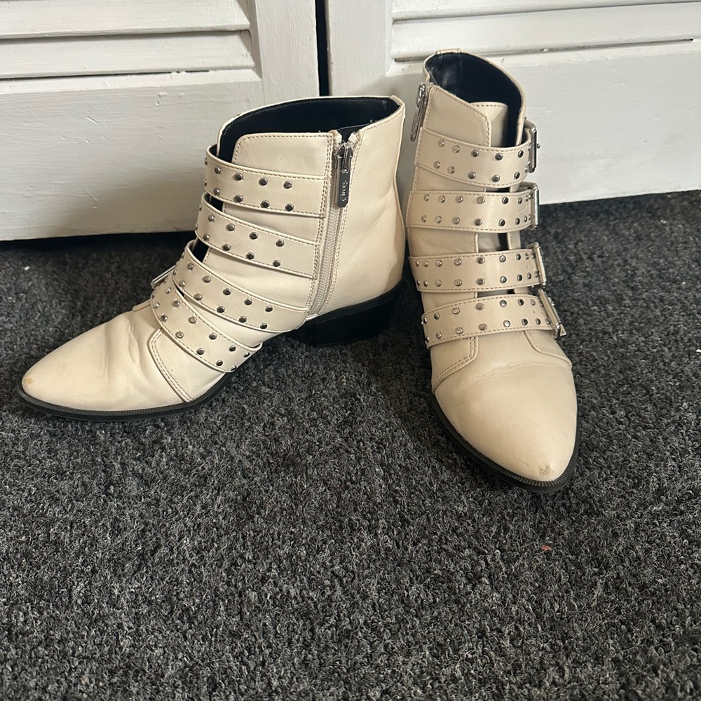 Cream colored rocker boots